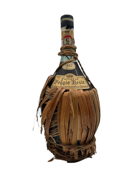 Vintage Chianti Classico 1957 fra Fattoria Poggio Reale i flettet kurv