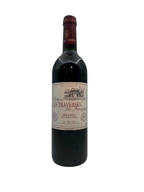 Bottle of Les Traverses Château 1997 red wine